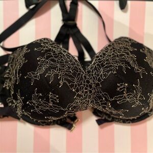 Victoria’s Secret very sexy push up pigeonnant black/gold lacy bra